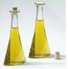 clear  cooking oil  glass bottle with cork