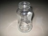 clear glass milk beverage bottle