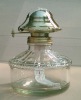 clear glass oil lamp