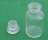 clear medicine packing bottle with cap