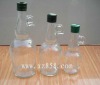 clear olive oil glass bottle with bar