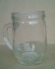 clear, transparent glass cup with handle