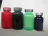 colorful plastic pill and powder bottle