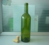 dark green corked wine bottled (K)