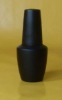 empty black glass nail polish bottle