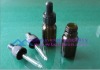 essential oil glass bottle and dropper