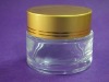 glass cream jar with golden lid