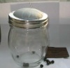 glass jar with sewingkit