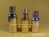 golden glass essential oil bottle