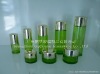 green cosmetic bottle and cosmetic jar