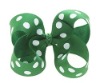green grosgrain hair bow with white dots printed