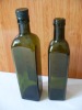 green olive oil glass bottle