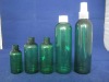 green plastic cosmetic bottles