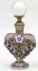 heart shaped metal perfume bottle