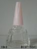 nail polish bottle with pink cap