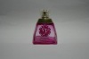 pink glass perfume bottle