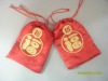 red drawstring silk bag