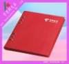 red leather notebook