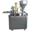 rotary type cup filling and sealing machine