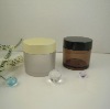 round clear cosmetic cream jar