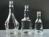 shaped clear glass wine bottle