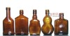 small amber glass wine bottle