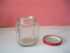 small hexagonal glass canning jar with tinplate lid