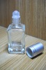 square roll on perfume bottle