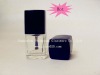 square transparent nail polish bottle with black cap