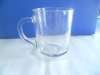 transprent glass cup with a handle.