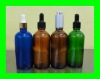 variety of amber ,blue ,green essential oil bottle