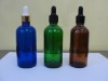 variety of amber ,blue ,green essential oil bottle