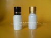 white essential oil bottle