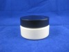 white jar with black cap