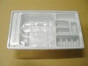 white plastic disposable tray for measuring device packing