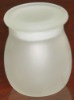 white sealed glass jar