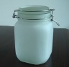 white sealed glass jar