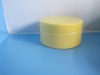 yellow plastic lotion jar